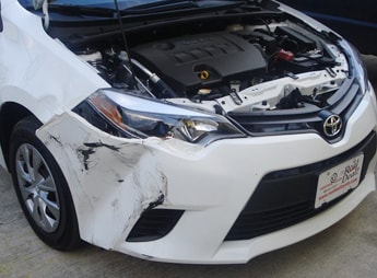 white car damaged | Star Collision Repair Auto Shop San Antonio